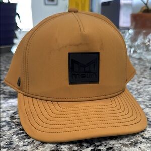 Melin Hydro Thermal Tan Cap with Black Logo - Odyssey - Classic Size - Stained